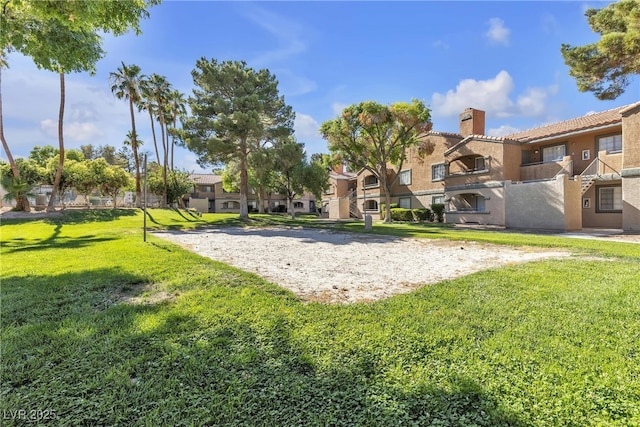 220 Mission Catalina Ln Unit 208, Las Vegas, NV 89107 - view of property's community featuring volleyball court, a yard, and a residential view