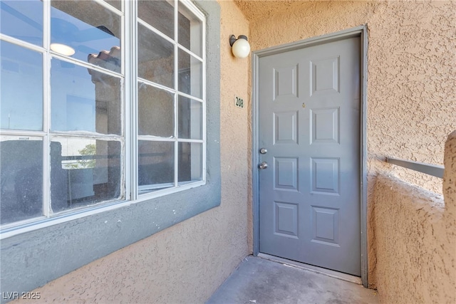 220 Mission Catalina Ln Unit 208, Las Vegas, NV 89107 - property entrance featuring stucco siding
