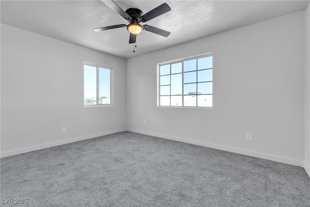 220 Mission Catalina Ln Unit 208, Las Vegas, NV 89107 - empty room featuring healthy amount of natural light, carpet, a textured ceiling, and a ceiling fan