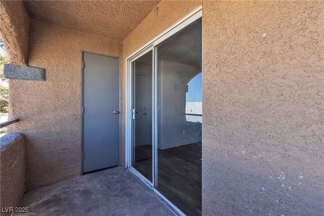220 Mission Catalina Ln Unit 208, Las Vegas, NV 89107 - entrance to property featuring stucco siding and a balcony