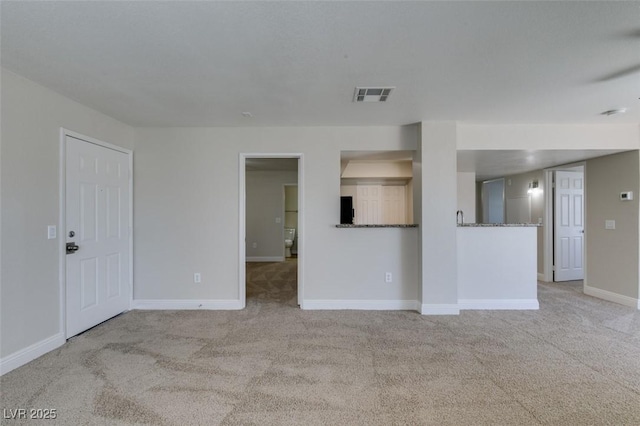 6800 E Lake Mead Blvd Unit 2072, Las Vegas, NV 89156 - unfurnished living room with carpet floors and baseboards