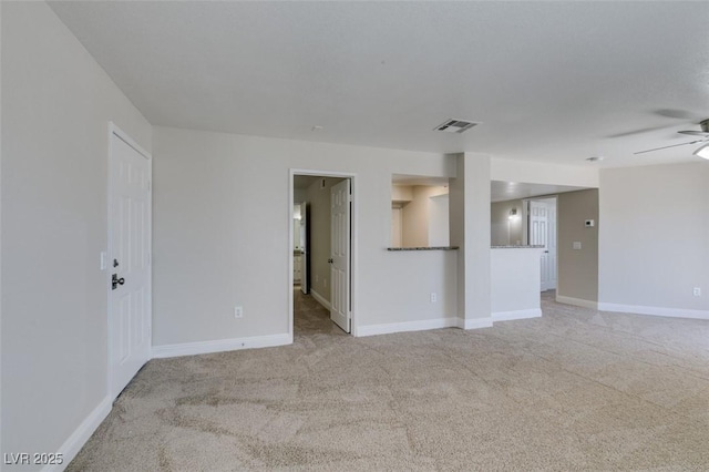6800 E Lake Mead Blvd Unit 2072, Las Vegas, NV 89156 - unfurnished living room with a ceiling fan and light carpet