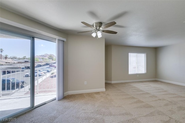 6800 E Lake Mead Blvd Unit 2072, Las Vegas, NV 89156 - unfurnished room featuring light carpet and ceiling fan