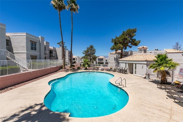 6800 E Lake Mead Blvd Unit 2072, Las Vegas, NV 89156 - community pool featuring a residential view and a patio area