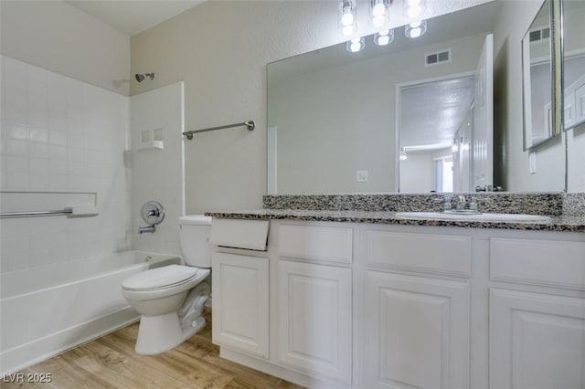6800 E Lake Mead Blvd Unit 2072, Las Vegas, NV 89156 - full bathroom with vanity, bathing tub / shower combination, and wood finished floors