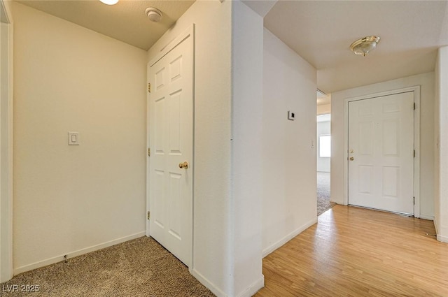 6160 Rumrill St Unit 202, Las Vegas, NV 89113 - hall featuring baseboards and light wood-style floors