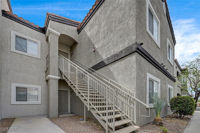 6160 Rumrill St Unit 202, Las Vegas, NV 89113 - view of building exterior with stairway