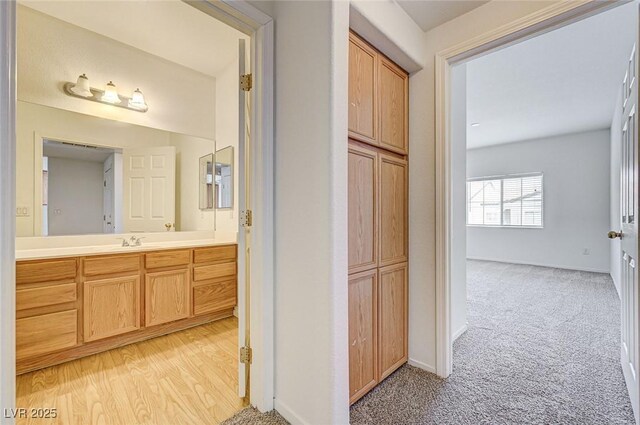 6160 Rumrill St Unit 202, Las Vegas, NV 89113 - bathroom featuring vanity and baseboards