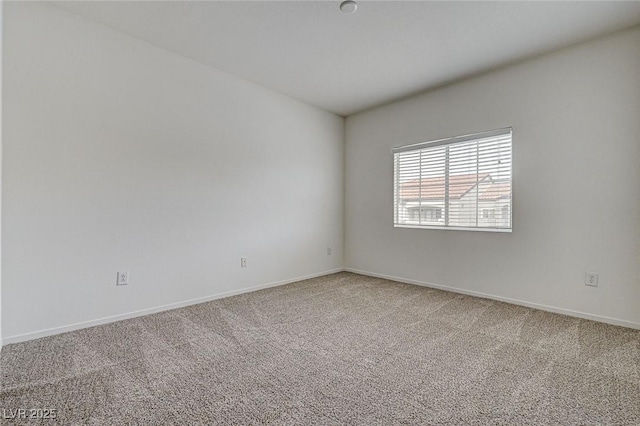 6160 Rumrill St Unit 202, Las Vegas, NV 89113 - carpeted empty room featuring baseboards