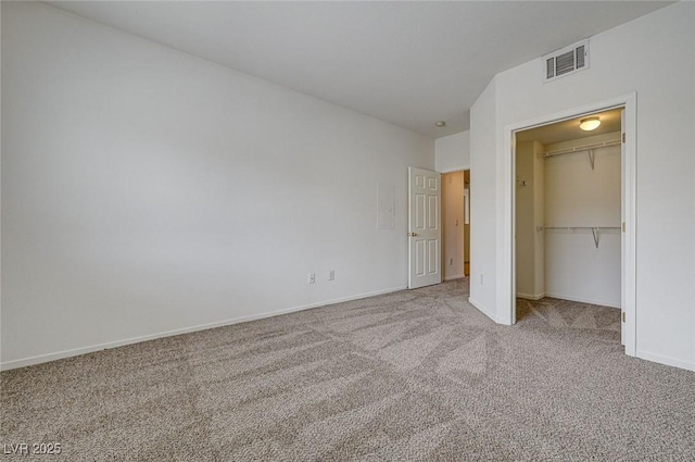 6160 Rumrill St Unit 202, Las Vegas, NV 89113 - unfurnished bedroom featuring carpet flooring, a closet, and a spacious closet