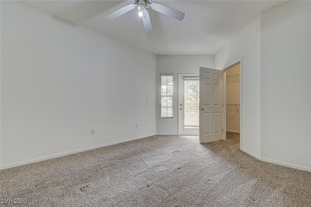 6160 Rumrill St Unit 202, Las Vegas, NV 89113 - spare room with carpet floors and a ceiling fan