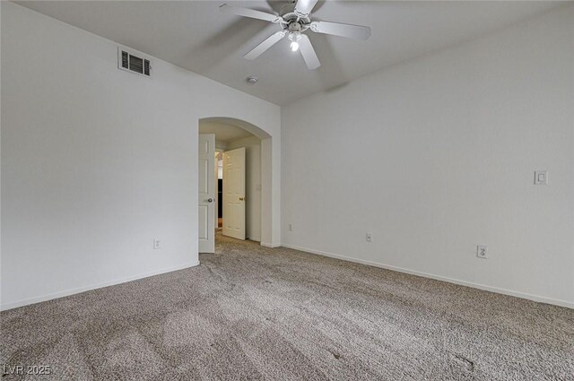 6160 Rumrill St Unit 202, Las Vegas, NV 89113 - spare room featuring arched walkways, vaulted ceiling, carpet flooring, and a ceiling fan