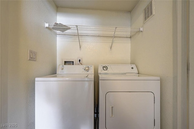 6160 Rumrill St Unit 202, Las Vegas, NV 89113 - laundry room featuring washer and clothes dryer