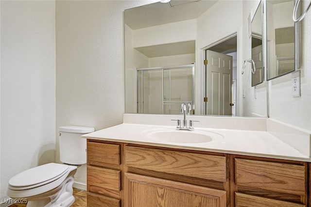 6160 Rumrill St Unit 202, Las Vegas, NV 89113 - bathroom featuring vanity and a shower with shower door