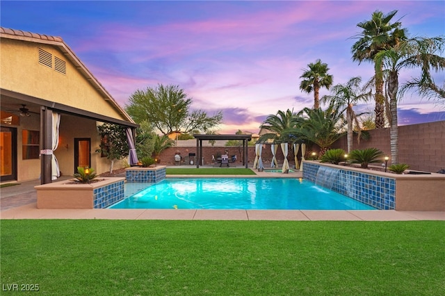9685 Stonily Ln, Las Vegas, NV 89178 - pool at dusk with a gazebo and a fenced backyard