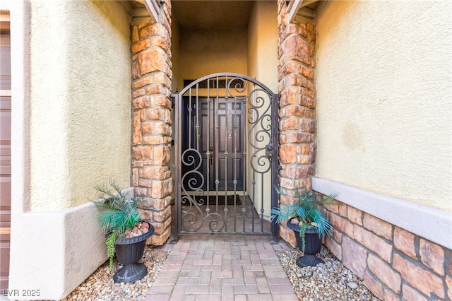 9685 Stonily Ln, Las Vegas, NV 89178 - entrance to property featuring stucco siding