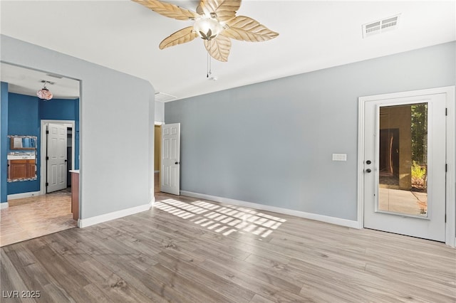 9685 Stonily Ln, Las Vegas, NV 89178 - empty room with a ceiling fan and wood finished floors