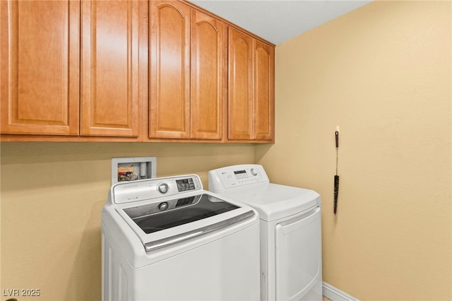 9685 Stonily Ln, Las Vegas, NV 89178 - laundry area featuring separate washer and dryer and cabinet space