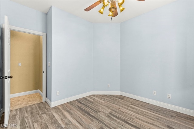 9685 Stonily Ln, Las Vegas, NV 89178 - unfurnished room featuring wood finished floors and a ceiling fan