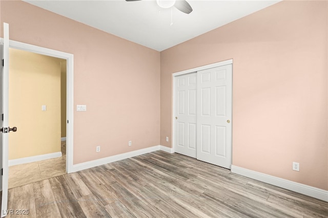 9685 Stonily Ln, Las Vegas, NV 89178 - unfurnished bedroom featuring wood finished floors, a closet, and ceiling fan