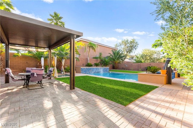 9685 Stonily Ln, Las Vegas, NV 89178 - view of swimming pool with a patio area, a fenced backyard, and outdoor dining space