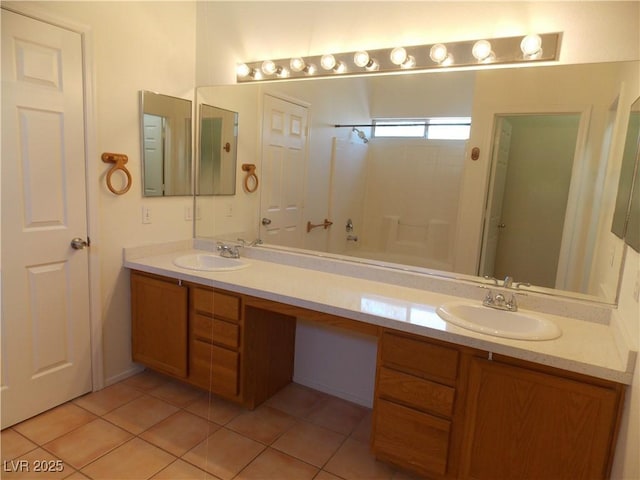 1018 Sun Poppy Ave, Las Vegas, NV 89123 - bathroom featuring double vanity, tile patterned floors, and a shower