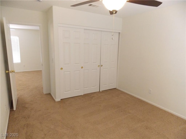 1018 Sun Poppy Ave, Las Vegas, NV 89123 - unfurnished bedroom with light carpet, a closet, and a ceiling fan