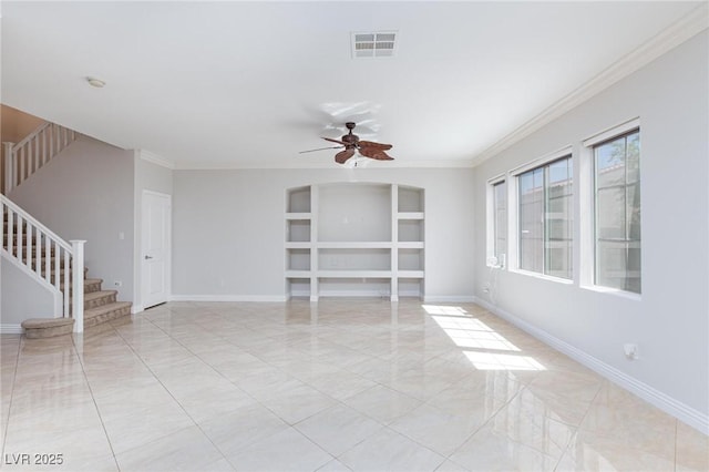 9814 Gifthouse St, Las Vegas, NV 89178 - unfurnished room with stairway, a ceiling fan, built in features, crown molding, and light marble finish flooring