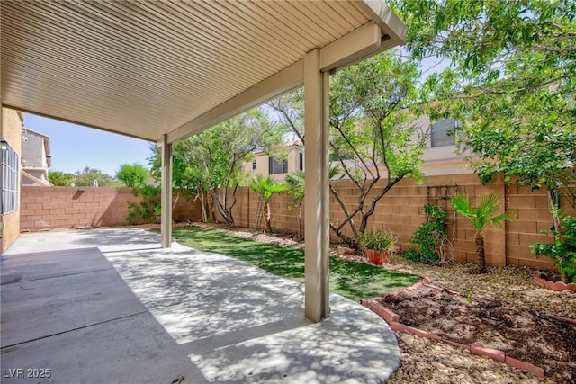 9814 Gifthouse St, Las Vegas, NV 89178 - fenced backyard with a patio area