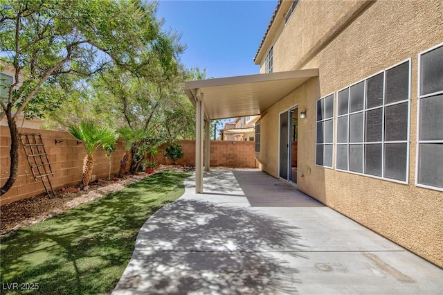 9814 Gifthouse St, Las Vegas, NV 89178 - fenced backyard featuring a patio