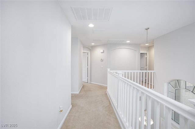 9814 Gifthouse St, Las Vegas, NV 89178 - hallway with light colored carpet, attic access, recessed lighting, and an upstairs landing