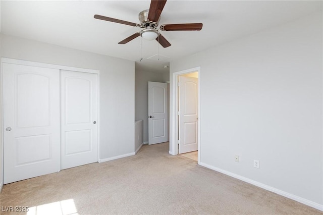 9814 Gifthouse St, Las Vegas, NV 89178 - unfurnished bedroom with light carpet, a closet, and a ceiling fan