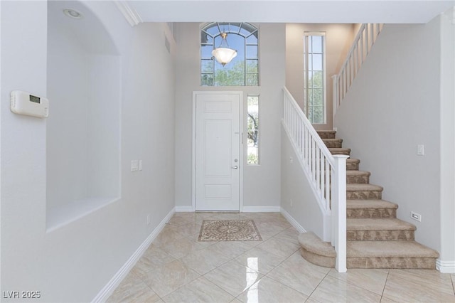 9814 Gifthouse St, Las Vegas, NV 89178 - foyer entrance with stairs and tile patterned flooring