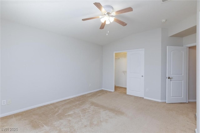 9814 Gifthouse St, Las Vegas, NV 89178 - unfurnished bedroom with carpet, lofted ceiling, a closet, a walk in closet, and ceiling fan