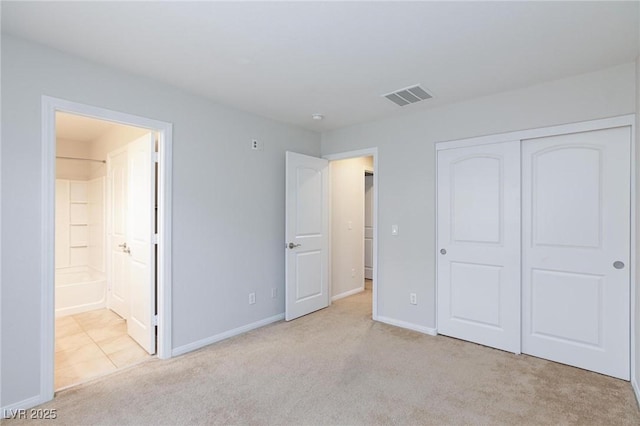 9814 Gifthouse St, Las Vegas, NV 89178 - unfurnished bedroom featuring carpet, ensuite bathroom, and a closet