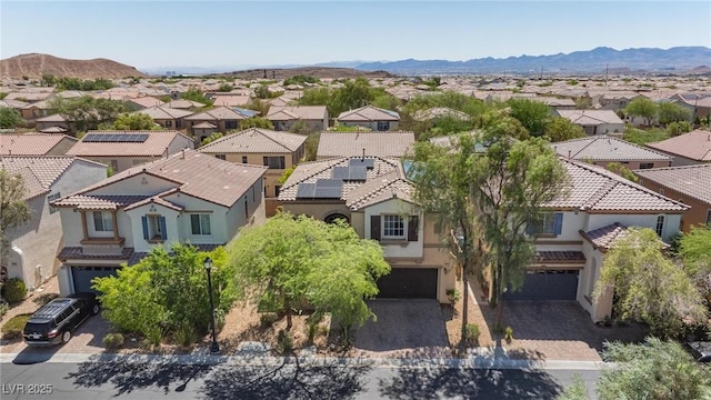 9814 Gifthouse St, Las Vegas, NV 89178 - aerial view of residential area with a mountain backdrop