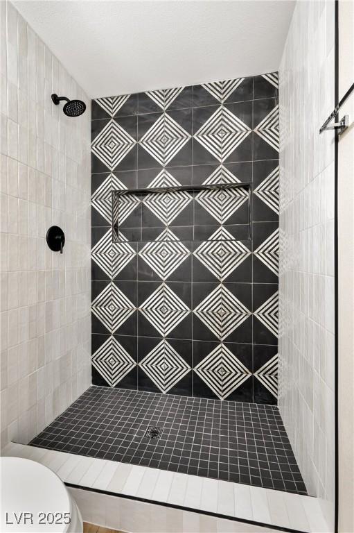 5004 Celebrity Cir, Las Vegas, NV 89119 - full bath featuring a tile shower and toilet