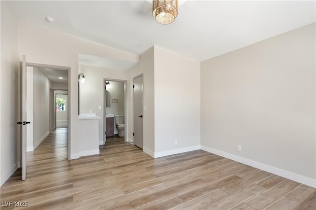 5004 Celebrity Cir, Las Vegas, NV 89119 - empty room featuring light wood-style floors and baseboards