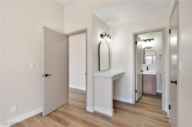 5004 Celebrity Cir, Las Vegas, NV 89119 - bathroom featuring wood finished floors and vanity