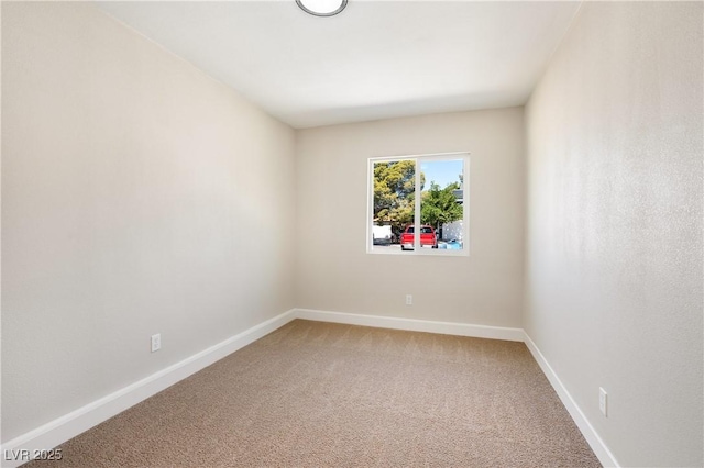 5004 Celebrity Cir, Las Vegas, NV 89119 - spare room featuring light colored carpet and baseboards