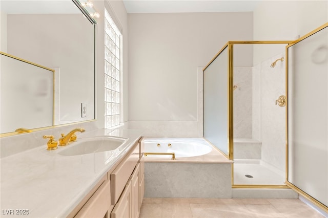 10548 Findlay Ave, Las Vegas, NV 89134 - full bathroom with vanity, healthy amount of natural light, a garden tub, and a stall shower