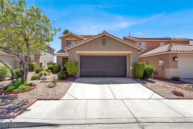1228 Swanbrooke Dr, Las Vegas, NV 89144 - view of front facade featuring a garage, stucco siding, concrete driveway, and a tiled roof