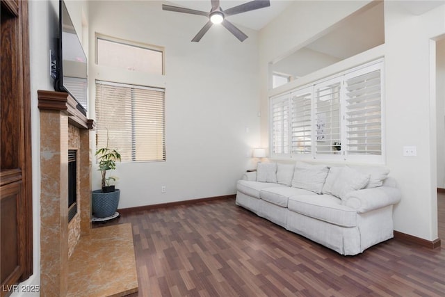 1839 Thunder Mountain Dr, Henderson, NV 89012 - living area featuring ceiling fan, wood finished floors, and a high end fireplace