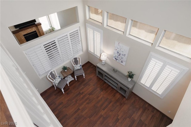1839 Thunder Mountain Dr, Henderson, NV 89012 - living room featuring wood finished floors and a fireplace