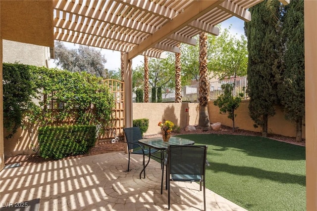 1839 Thunder Mountain Dr, Henderson, NV 89012 - fenced backyard featuring a patio, a pergola, and outdoor dining space