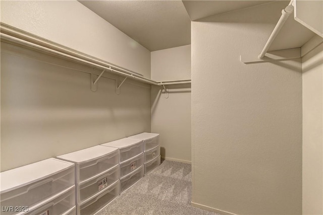 278 Star Cluster Cir, Las Vegas, NV 89145 - spacious closet featuring carpet floors