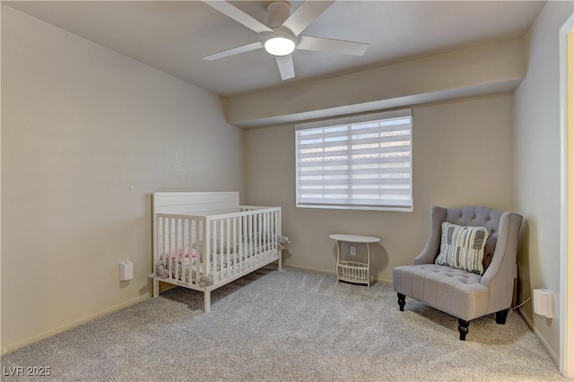278 Star Cluster Cir, Las Vegas, NV 89145 - bedroom featuring carpet floors, a ceiling fan, and a nursery area