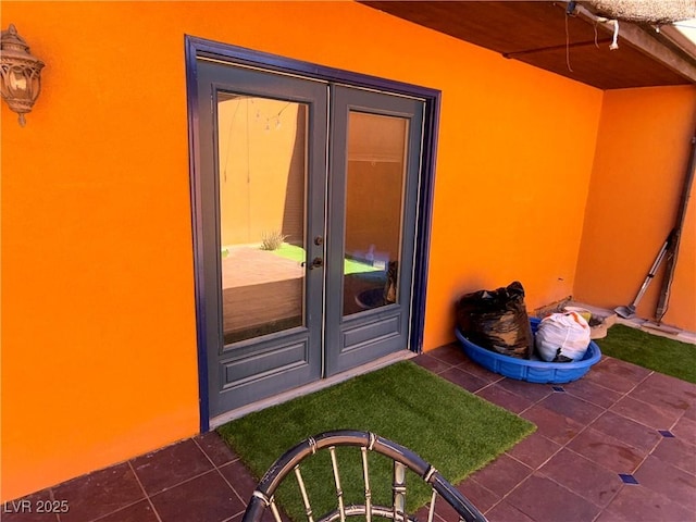 3447 One Nation Ave, Las Vegas, NV 89121 - doorway to property with stucco siding and french doors