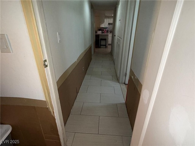 3447 One Nation Ave, Las Vegas, NV 89121 - corridor with light tile patterned flooring
