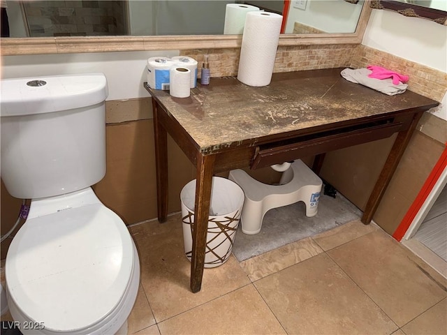 3447 One Nation Ave, Las Vegas, NV 89121 - bathroom with decorative backsplash, tile patterned floors, and vanity